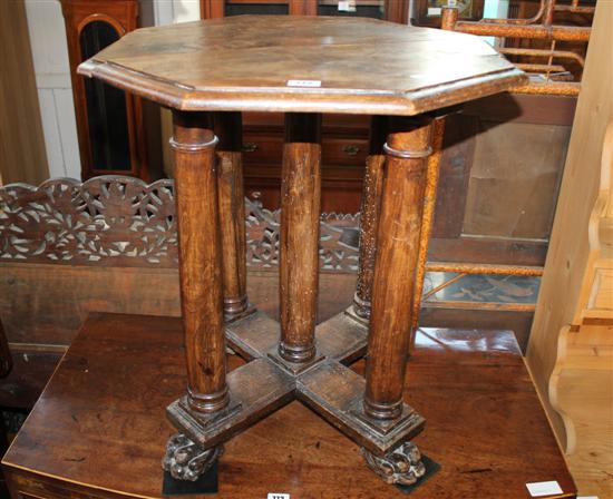 Octagonal oak table on carved claw feet